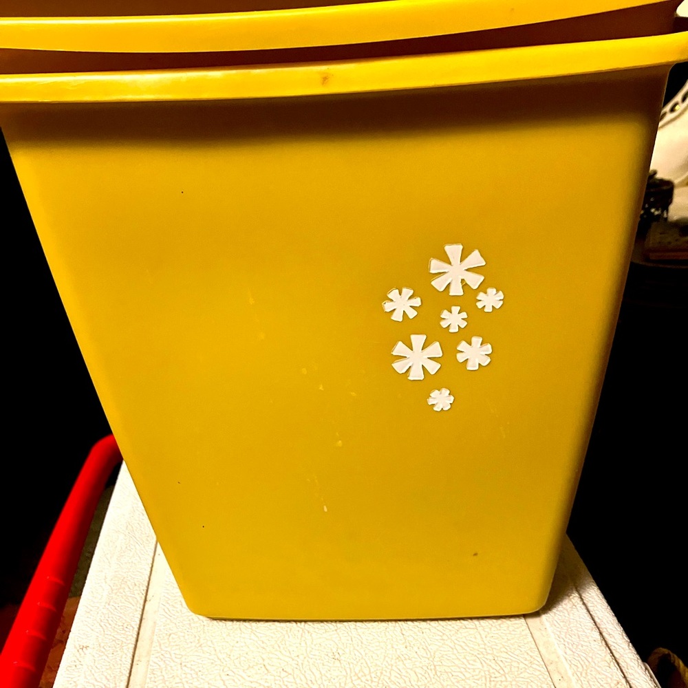 Vintage yellow 70s style trash can